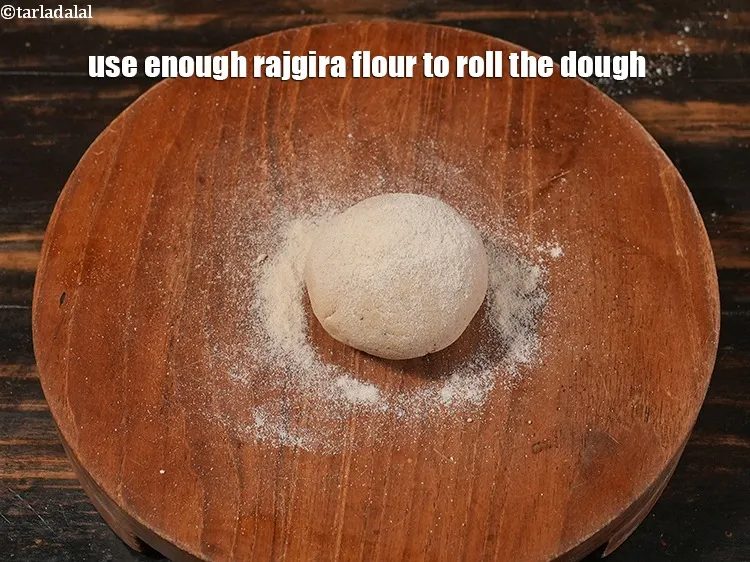 Step 22 – <p>Use enough rajgira flour to roll the dough.</p>
