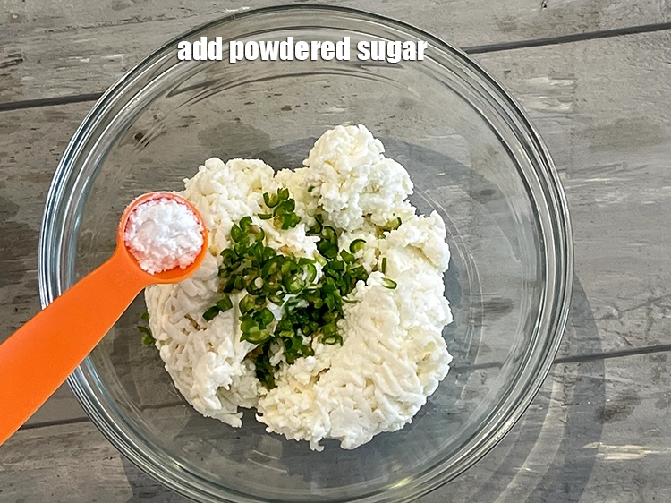 Step 5 – <p>Add <span style="background-color:rgb(255,255,255);color:rgb(0,0,0);">1/2 tsp </span><a href="https://www.tarladalal.com/glossary-powdered-sugar-280i"><u>powdered sugar</u></a>.&nbsp;</p>