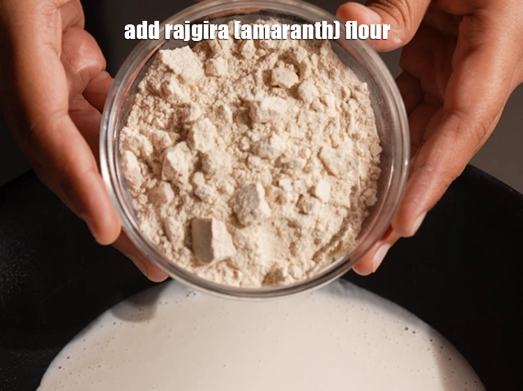 Step 10 – <p><span style="background-color:rgb(255,255,255);color:rgb(0,0,0);">Now, add the 1/2 cup </span><a href="https://www.tarladalal.com/glossary-rajgira-flour-ramadana-flour-amaranth-flour-rajgira-ka-atta-1297i"><u>rajgira (amaranth) flour</u></a><span style="background-color:rgb(255,255,255);color:rgb(0,0,0);">. Alternatively, you can even …
