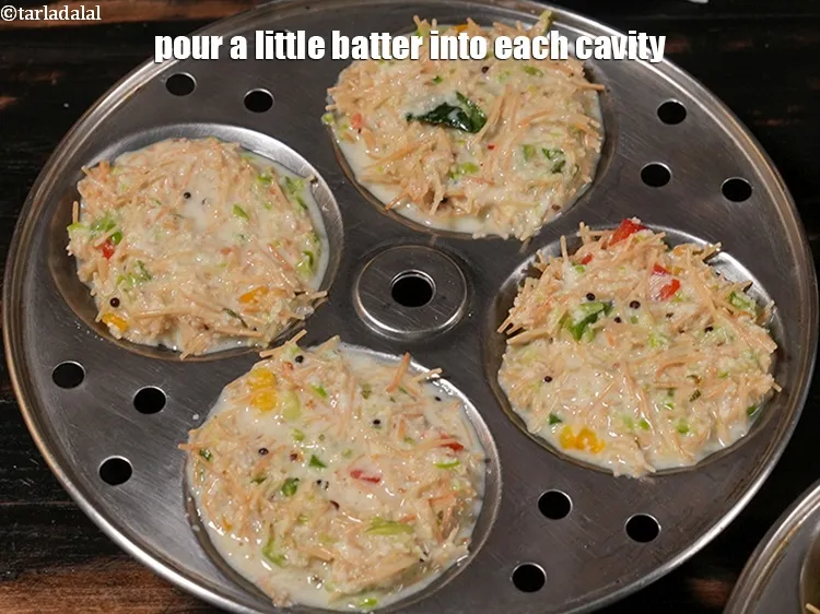 Step 50 – <p><span style="color:rgb(0,0,0);">Pour a little batter into each cavity.</span></p>