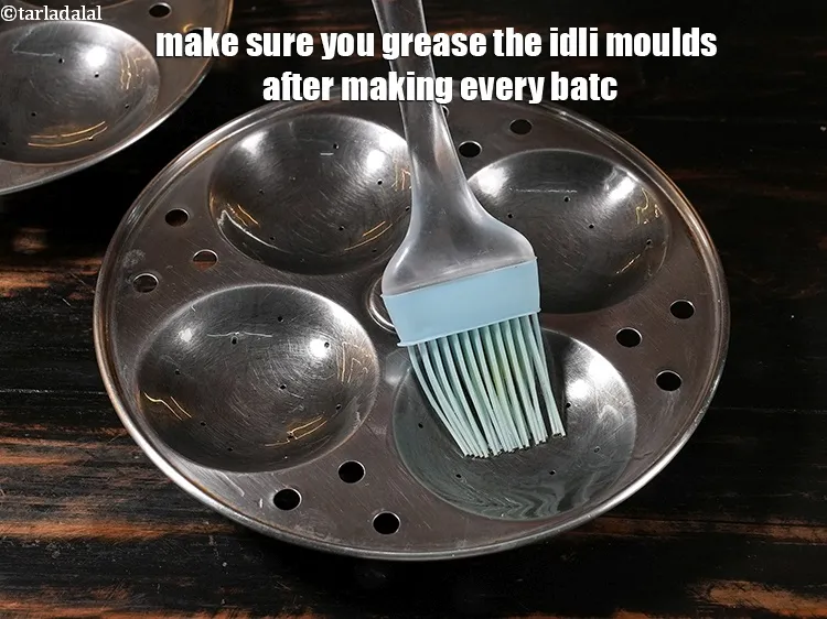 Step 58 – <p><span style="color:rgb(0,0,0);">Make sure you grease the idli moulds after making every batch.</span></p>