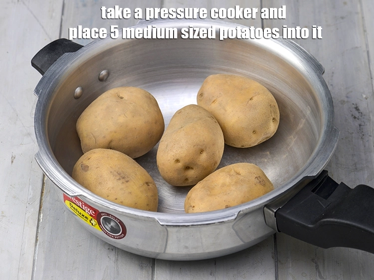 Step 2 – <p>To make <strong>Batata Nu Shaak (Bateta Nu Shaak)&nbsp;</strong>, take a pressure cooker and place 5 …