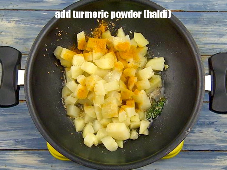 Step 14 – <p>Add <span style="background-color:rgb(255,255,255);color:rgb(0,0,0);">1/2 tsp </span><a href="https://www.tarladalal.com/glossary-turmeric-powder-haldi-645i"><u>turmeric powder (haldi)</u></a>.</p>