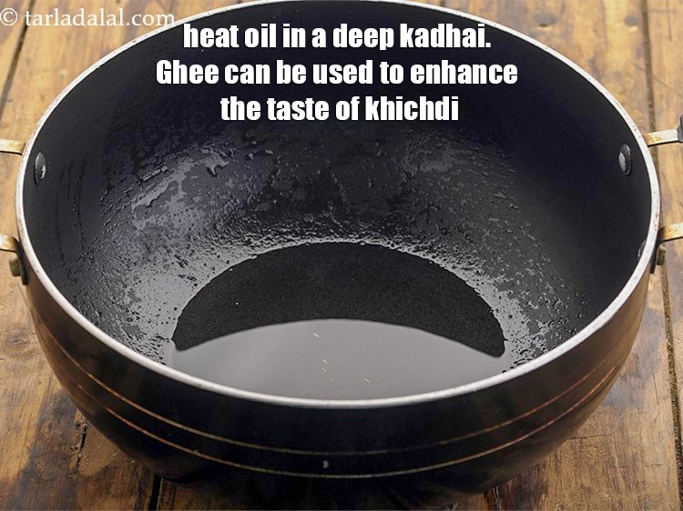 Step 17 – <p><span style="background-color:rgb(255,255,255);color:rgb(0,0,0);">To temper moong dal khichdi, heat the 1 tbsp </span><a href="https://www.tarladalal.com/glossary-oil-671i"><u>oil</u></a><span style="background-color:rgb(255,255,255);color:rgb(0,0,0);"> in a …