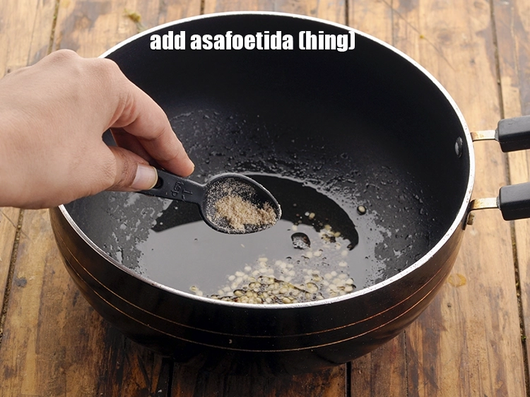 Step 20 – <p><span style="background-color:rgb(255,255,255);color:rgb(0,0,0);">Add 1/4 tsp </span><a href="https://www.tarladalal.com/glossary-asafoetida-hing-113i"><u>asafoetida (hing)</u></a><span style="background-color:rgb(255,255,255);color:rgb(0,0,0);">. If preparing in winter and you feel …