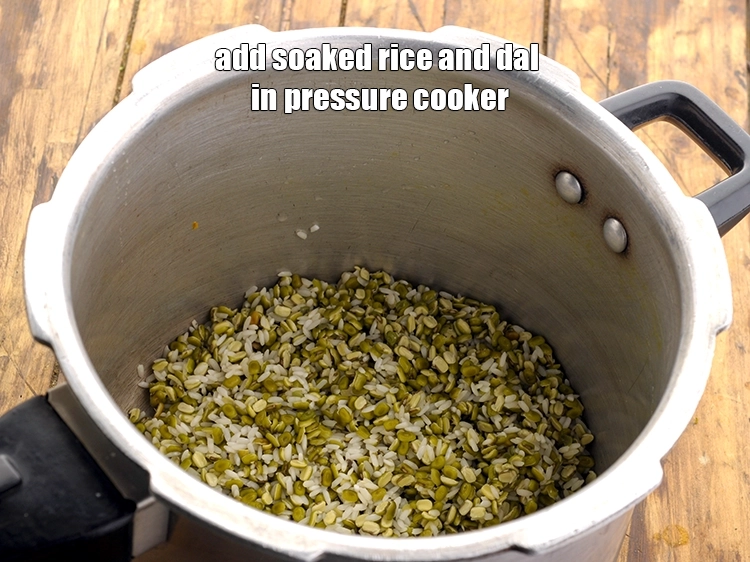 Step 12 – <p>After 2 hours, drain the soaked <a href="https://www.tarladalal.com/glossary-rice-chawal-533i"><u>rice (chawal)</u></a> and <a href="https://www.tarladalal.com/glossary-green-moong-dal-split-green-gram-hari-mung-dal-522i"><u>green moong dal (split …