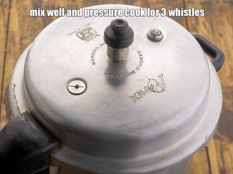 Step 15 – <p>Mix well and pressure cook for 3 whistles.</p>