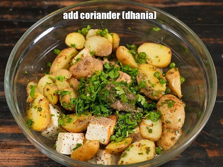 Step 43 – <p><span style="background-color:rgb(255,255,255);color:rgb(0,0,0);">Add 1 tbsp&nbsp;</span><a href="https://www.tarladalal.com/glossary-coriander-dhania-kothmir-369i"><u>coriander (dhania)</u></a><span style="background-color:rgb(255,255,255);color:rgb(0,0,0);">.</span></p>