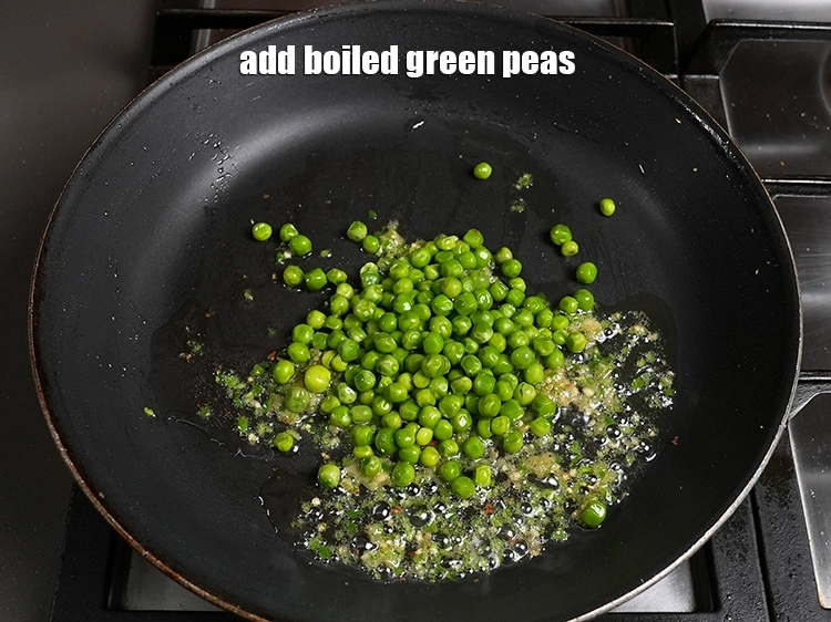 Step 37 – <p><span style="color:rgb(0,0,0);">Add 1/2 cup&nbsp;</span><a href="https://www.tarladalal.com/glossary-boiled-green-peas-1078i">boiled green peas</a><span style="color:rgb(0,0,0);">.</span></p>