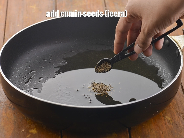 Step 3 – <p>Add <span style="background-color:rgb(255,255,255);color:rgb(0,0,0);">1/2 tsp </span><a href="https://www.tarladalal.com/glossary-cumin-seeds-jeera-zeera-381i"><u>cumin seeds (jeera)</u></a><u>.</u></p>