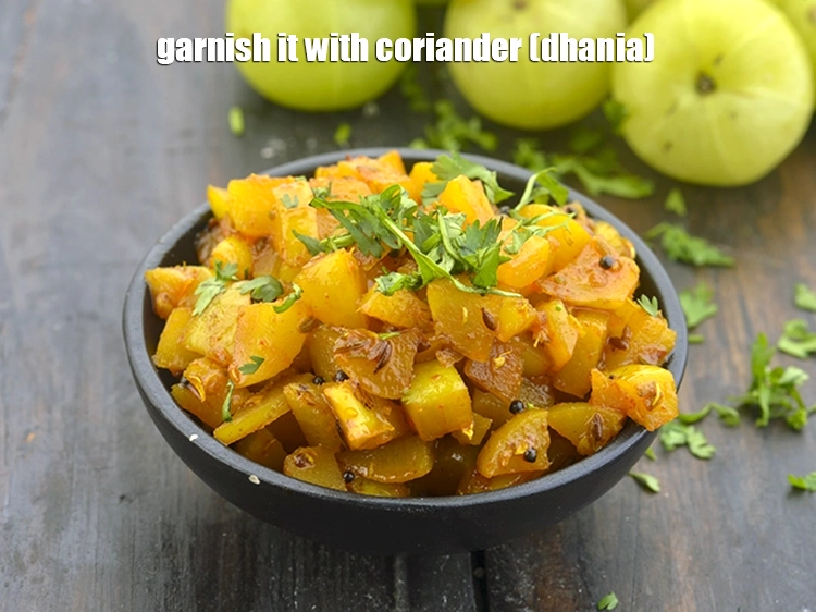 Step 8 – <p><span style="background-color:rgb(255,255,255);color:rgb(0,0,0);">Garnish it with 2 tsp </span><a href="https://www.tarladalal.com/glossary-coriander-dhania-kothmir-369i#ing_2365"><u>chopped coriander (dhania)</u></a><span style="background-color:rgb(255,255,255);color:rgb(0,0,0);">.</span></p>