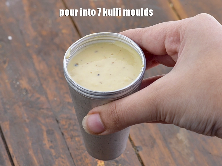 Step 13 – <p><span style="background-color:rgb(255,255,255);color:rgb(0,0,0);">Pour the mixture into 7 kulfi moulds.</span></p>