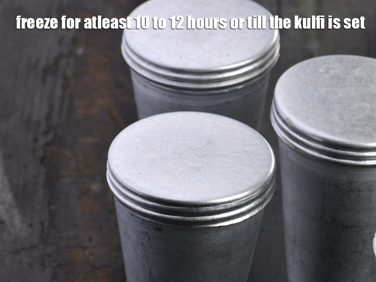 Step 14 – <p><span style="background-color:rgb(255,255,255);color:rgb(0,0,0);">Freeze for atleast 10 to 12 hours or till the kulfi is set.</span></p>