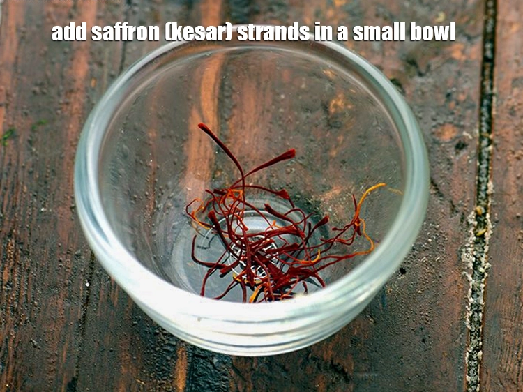 Step 5 – <p><span style="background-color:rgb(255,255,255);color:rgb(0,0,0);">Add a few </span><a href="https://www.tarladalal.com/glossary-saffron-kesar-520i"><u>saffron (kesar) strands</u></a><span style="background-color:rgb(255,255,255);color:rgb(0,0,0);">&nbsp;in a small bowl.</span></p>