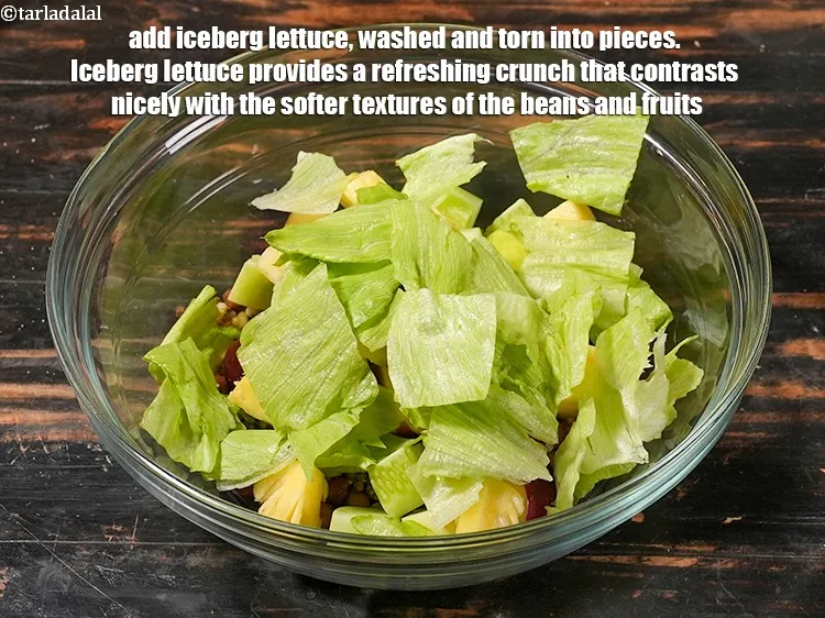 Step 12 – <p>Add ¾ cup <a href="https://www.tarladalal.com/glossary-iceberg-lettuce-iceberg-salad-ke-patte-499i">iceberg lettuce</a>, washed and torn into pieces. Iceberg lettuce provides a …