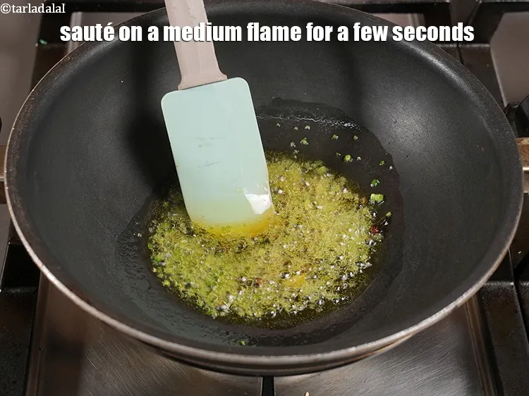 Step 13 – <p>Sauté on a medium flame for a few seconds.</p>