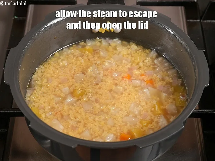 Step 14 – <p>Allow the steam to escape and then open the lid.</p>