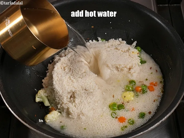 Step 21 – <p>Add 2 cups of hot water.</p>
