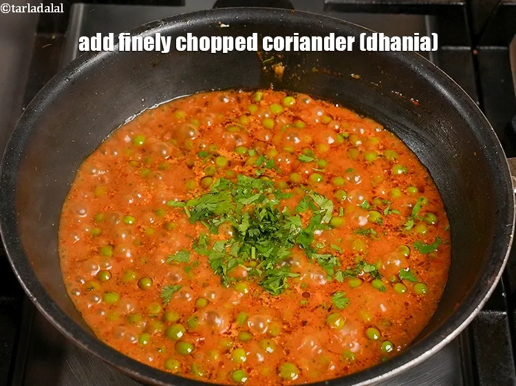 Step 30 – <p><span style="color:rgb(0,0,0);">Add&nbsp;2 tbsp&nbsp;finely&nbsp;</span><a href="https://www.tarladalal.com/glossary-chopped-coriander-783i">chopped coriander (dhania)</a><span style="color:rgb(0,0,0);">.</span></p>