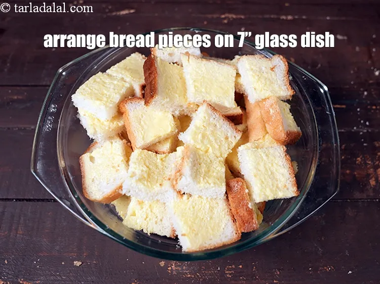 Step 16 – <p>Arrange the bread pieces with the buttered side facing up on a greased 175 mm. …