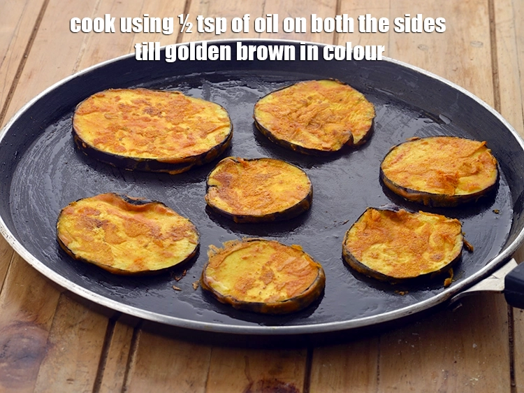 Step 8 – <p><span style="background-color:rgb(255,255,255);color:rgb(0,0,0);">Cook using ½ tsp of </span><a href="https://www.tarladalal.com/glossary-oil-671i"><u>oil&nbsp;</u></a><span style="background-color:rgb(255,255,255);color:rgb(0,0,0);"> on both the sides till golden …