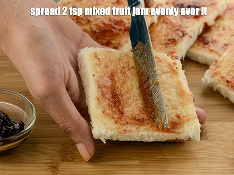 Step 3 – <p><span style="background-color:rgb(255,255,255);color:rgb(0,0,0);">Place a bread slice on a clean, dry surface and spread 2 tsp </span><a …