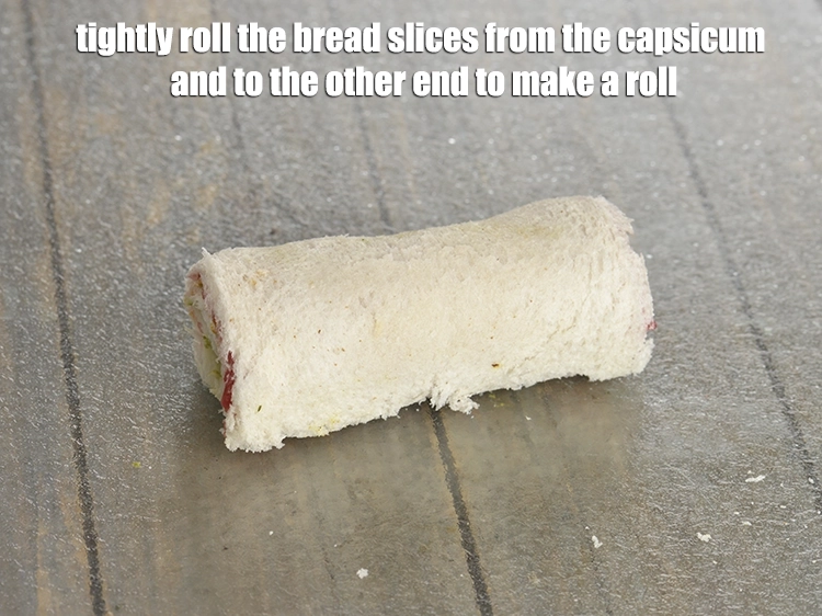 Step 8 – <p><span style="background-color:rgb(255,255,255);color:rgb(0,0,0);">Tightly roll the bread slices from the capsicum and to the other end to …