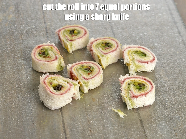 Step 9 – <p><span style="background-color:rgb(255,255,255);color:rgb(0,0,0);">Cut the roll into 7 equal portions using a sharp knife.</span></p>