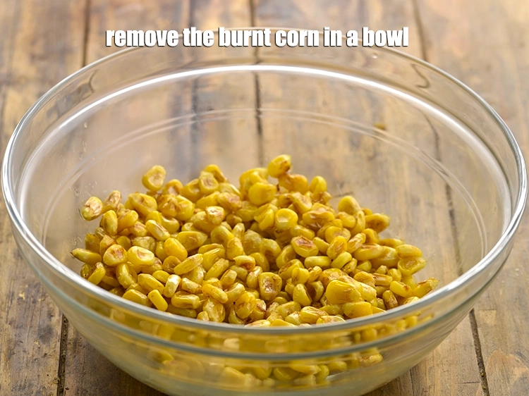 Step 12 – <p>Remove the burnt corn in a bowl.</p>