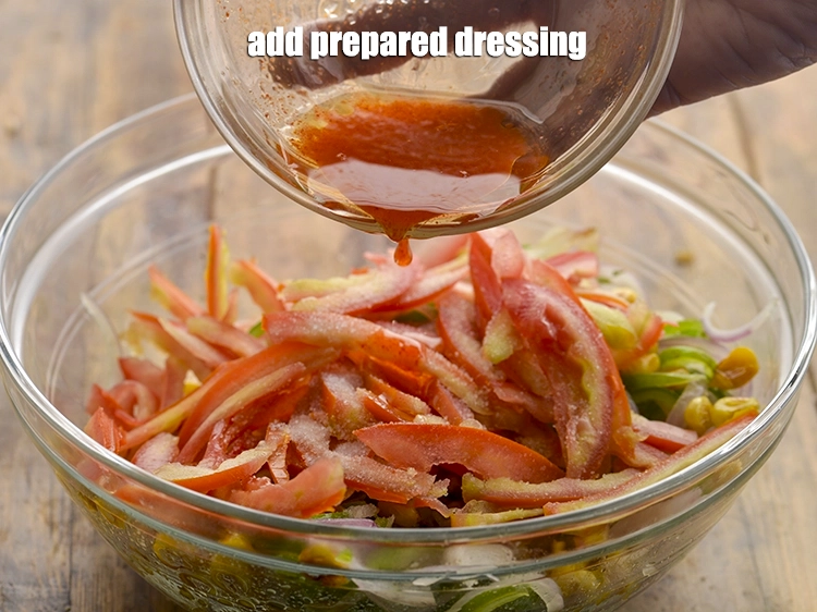 Step 20 – <p>Add the <strong>prepared dressing</strong>.</p>
