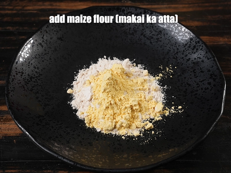 Step 3 – <p>Add <span style="background-color:rgb(255,255,255);color:rgb(0,0,0);">2 tbsp </span><a href="https://www.tarladalal.com/glossary-maize-flour-makai-ka-atta-makki-ka-atta-162i"><u>maize flour (makai ka atta)</u></a><u>.</u></p>