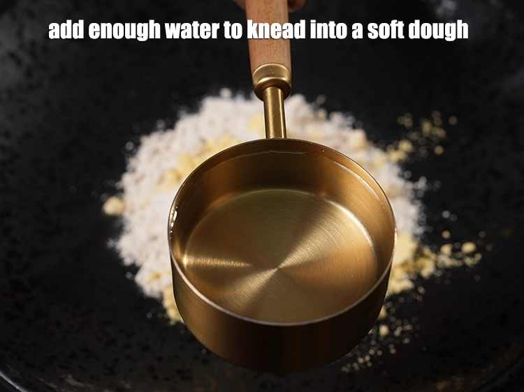 Step 5 – <p><span style="background-color:rgb(255,255,255);color:rgb(0,0,0);">Add enough water to knead into a soft dough.</span></p>
