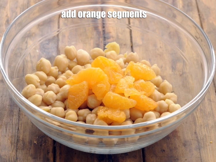 Step 26 – <p>Add <span style="background-color:rgb(255,255,255);color:rgb(0,0,0);">1/4 cup </span><a href="https://www.tarladalal.com/glossary-orange-narangi-santra-114i#ing_2994"><u>orange segments </u></a><span style="background-color:rgb(255,255,255);color:rgb(0,0,0);">, peeled , deseeded and cut into …