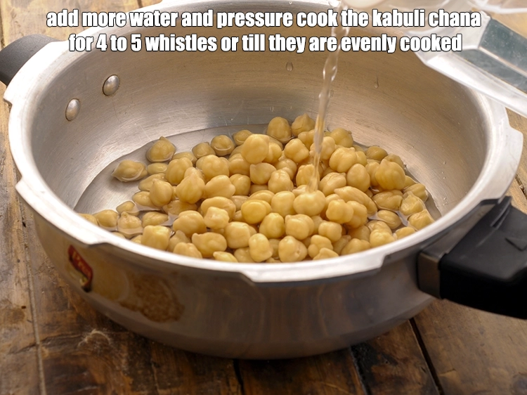 Step 14 – <p>Add more water and pressure cook the <a href="https://www.tarladalal.com/glossary-kabuli-chana-chickpeas-garbanzo-chole-chana-290i#ing_2869"><u>kabuli chana (white chick peas)</u></a> for 4 …