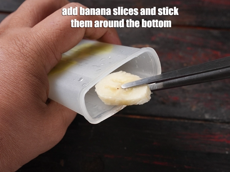Step 8 – <p>Add <a href="https://www.tarladalal.com/glossary-banana-kela-17i"><u>banana </u></a><span style="background-color:rgb(255,255,255);color:rgb(0,0,0);">slices banana and stick them around the bottom.</span></p>
