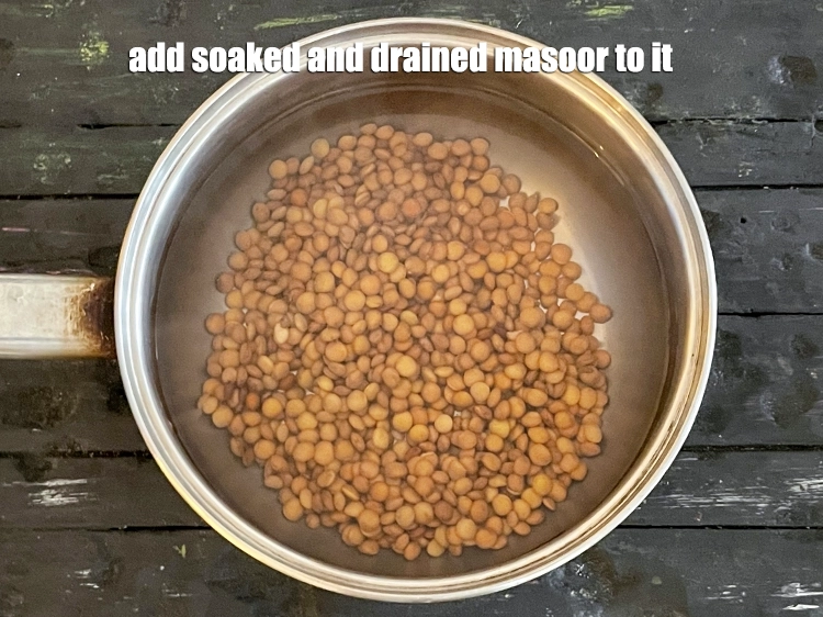 Step 33 – <p>Add the soaked and drained masoor to it.&nbsp;</p>