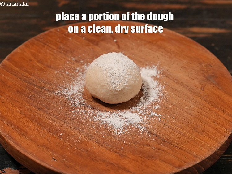 Step 46 – <p><span style="background-color:rgb(255,255,255);color:rgb(0,0,0);">Put one portion of the dough on the rolling board and some whole wheat …