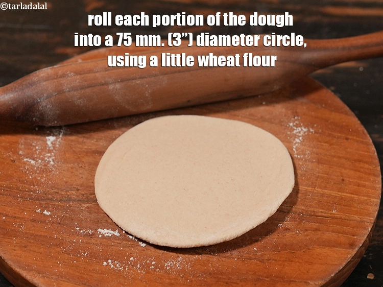 Step 47 – <p><span style="background-color:rgb(255,255,255);color:rgb(0,0,0);">Roll a portion of the dough into a 75 mm. (3”) diameter circle using …
