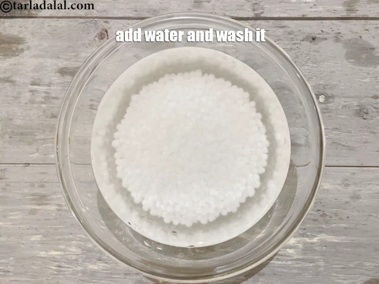 Step 4 – <p>Put sabudana in a glass bowl of water and wash it with your hands. Not …
