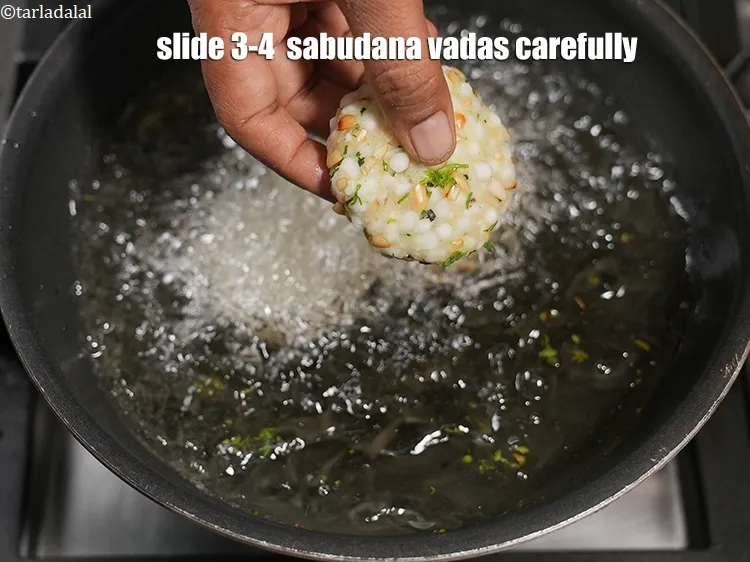 Step 37 – <html><head><meta charset="UTF-8"> </head><body><p>Slide 3-4 &nbsp;<strong>sabudana vadas</strong>&nbsp;carefully. The number of vadas will depend upon the size …