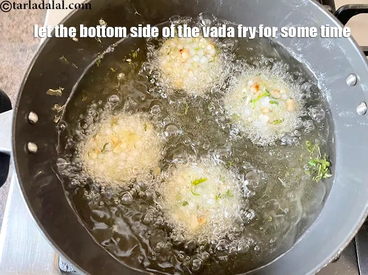 Step 38 – <p>Let the bottom side of the vada fry for some time. Don't rush in flipping …