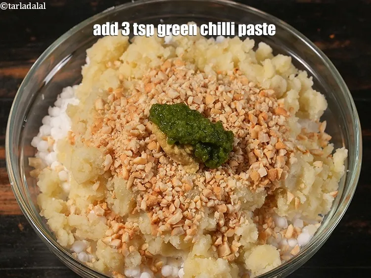 Step 27 – <p><span style="background-color:rgb(255,255,255);color:rgb(0,0,0);">Add&nbsp;2 tsp&nbsp;green&nbsp;</span><a href="https://www.tarladalal.com/chilli-paste-22538r"><u>chilli paste</u></a><span style="background-color:rgb(255,255,255);color:rgb(0,0,0);">.</span></p>