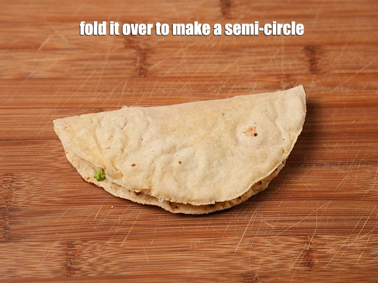 Step 12 – <p><span style="background-color:rgb(255,255,255);color:rgb(0,0,0);">Fold over the other half of the circle over the stuffing to make a …