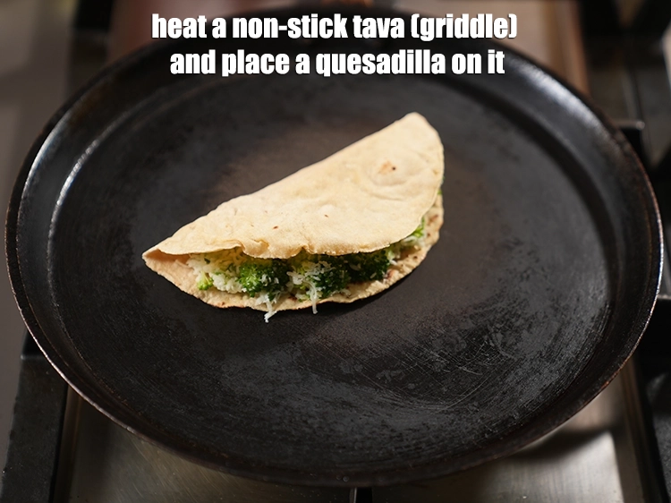 Step 14 – <p><span style="background-color:rgb(255,255,255);color:rgb(0,0,0);">Heat a non-stick tava (griddle) and place the stuffed&nbsp;</span><strong>Broccoli, Cheese and Chilli Quesadillas</strong><span style="background-color:rgb(255,255,255);color:rgb(0,0,0);">&nbsp;on …