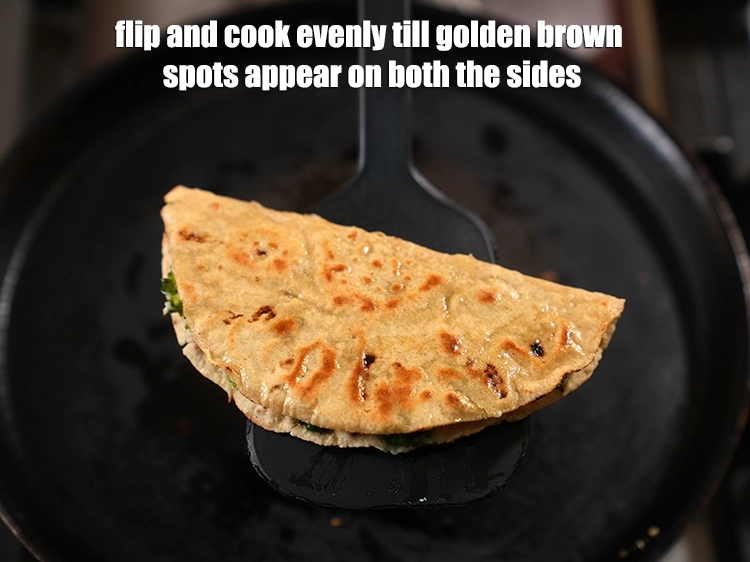 Step 17 – <p><span style="background-color:rgb(255,255,255);color:rgb(0,0,0);">Cook till both the sides are golden brown in colour.</span></p>