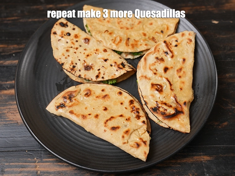 Step 18 – <p><span style="background-color:rgb(255,255,255);color:rgb(0,0,0);">Repeat with the remaining tortillas and stuffing to make 3 more quesadillas.</span></p>