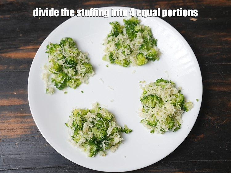Step 9 – <p><span style="background-color:rgb(255,255,255);color:rgb(0,0,0);">Divide the stuffing into 4 equal portions and keep aside.</span></p>