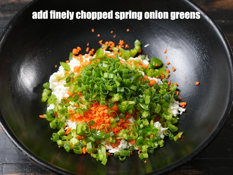 Step 6 – <p>Add <span style="background-color:rgb(255,255,255);color:rgb(0,0,0);">2 tbsp finely </span><a href="https://www.tarladalal.com/glossary-spring-onion-greens-hare-pyaz-ke-patte-445i#ing_2424"><u>chopped spring onion greens</u></a><u>.</u></p>