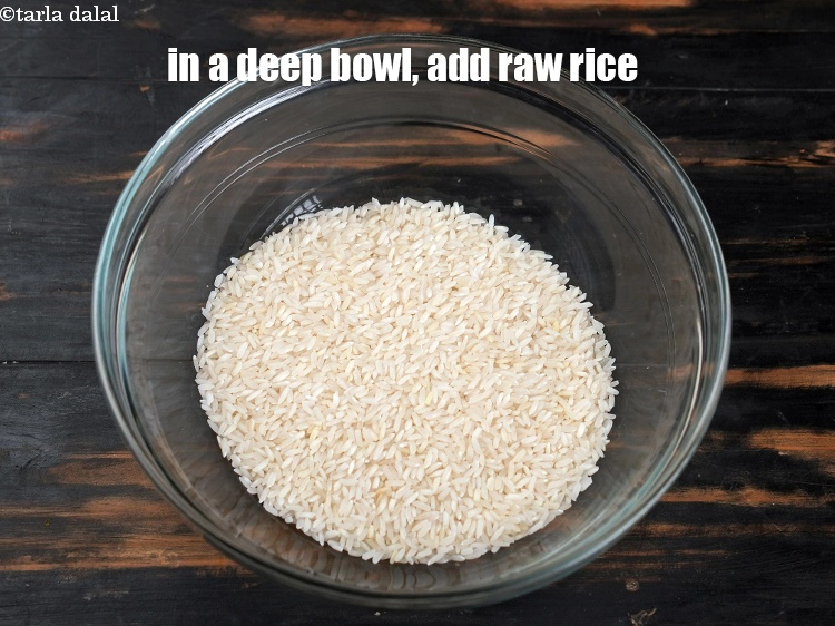 Step 1 – <p><span style="background-color:rgb(255,255,255);color:rgb(0,0,0);">In a deep bowl, add 1 cup raw </span><a href="https://www.tarladalal.com/glossary-rice-chawal-533i"><u>rice (chawal)</u></a><u>.</u></p>