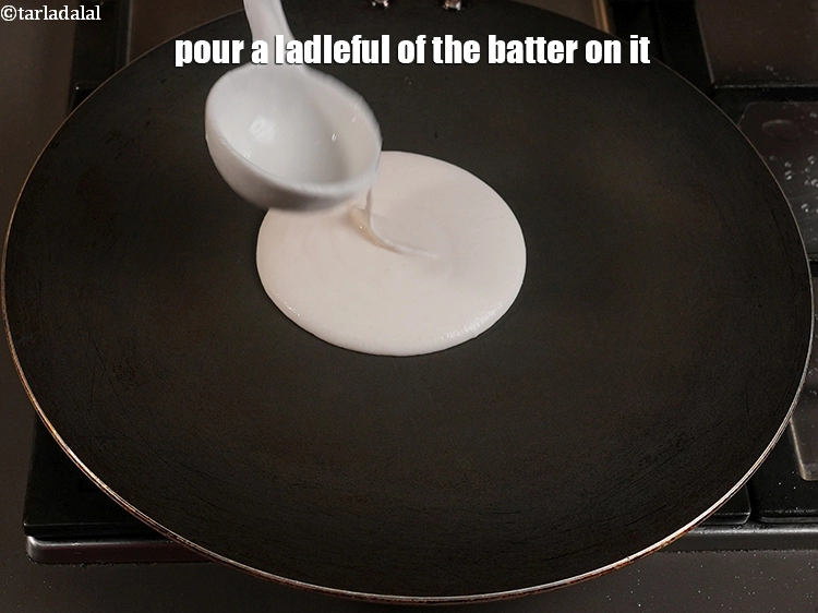 Step 19 – <p><span style="background-color:rgb(255,255,255);color:rgb(0,0,0);">Pour a ladleful of the batter over it.</span></p>